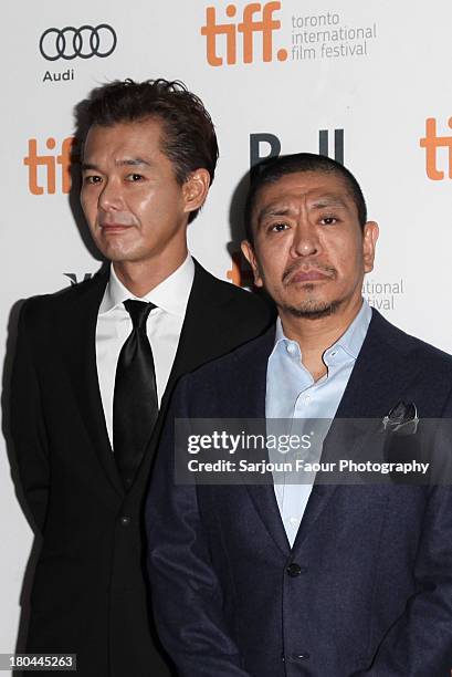 Actor Atsuro Watabe and Director Hitoshi Matsumoto arrive at the "R100" premiere during the 2013 Toronto International Film Festival at Ryerson...
