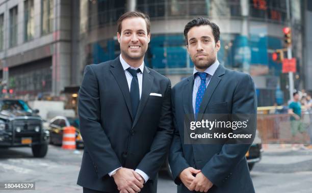 David Goldberg and Ari Goldberg ring closing bell at NASDAQ MarketSite on September 12, 2013 in New York City.