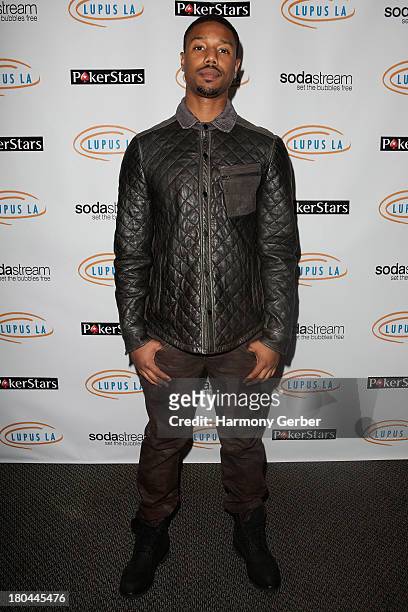 Michael B. Jordan attends the Get Lucky For Lupus LA! event at Peterson Automotive Museum on September 12, 2013 in Los Angeles, California.