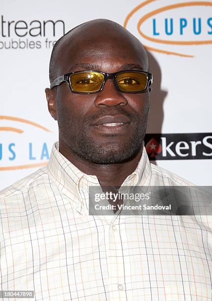 Actor Cheick Kongo attends Get Lucky For Lupus LA at Peterson Automotive Museum on September 12, 2013 in Los Angeles, California.