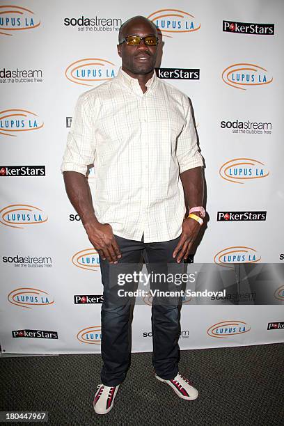 Actor Cheick Kongo attends Get Lucky For Lupus LA at Peterson Automotive Museum on September 12, 2013 in Los Angeles, California.