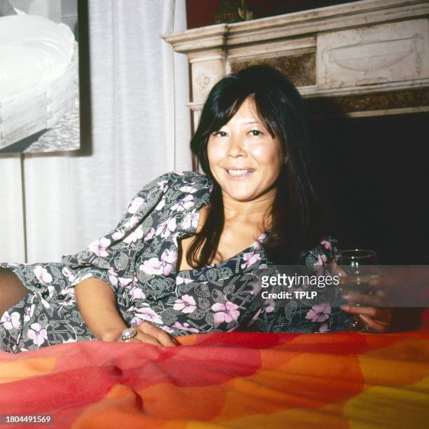 Portrait of Chinese actress Tsai Chin as she holds a wine glass, London, England, October 5, 1971.