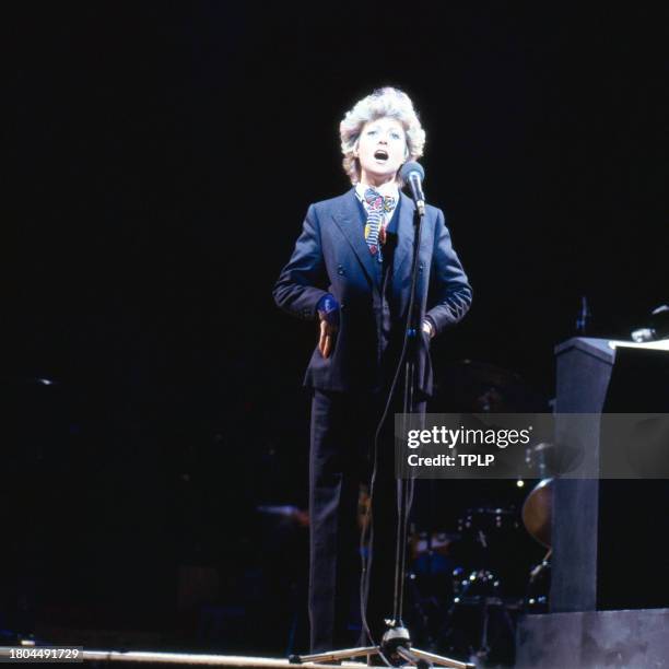 Photo of British Pop singer and actress Elaine Paige as she performs on stage, London, England, March 4, 1982.