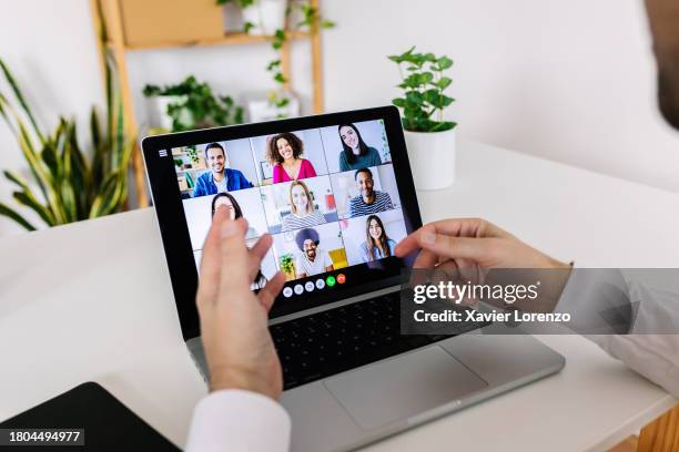 unrecognizable person studying online from home - master of business administration stockfoto's en -beelden