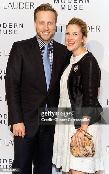 Actress Drew Barrymore and InStyle Managing Editor Ariel Foxman attend the Estee Lauder "Modern Muse" Fragrance Launch at Guggenheim Museum on...