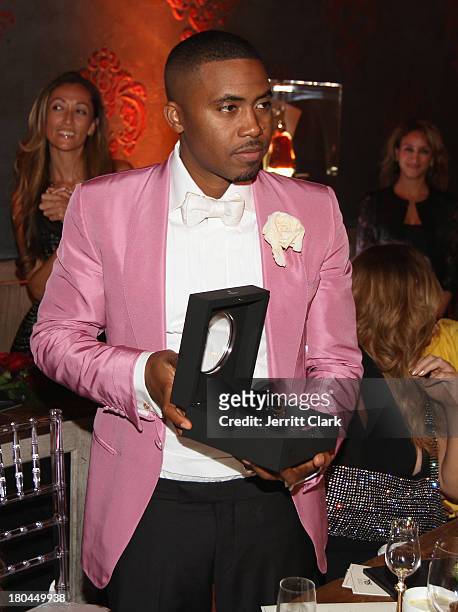 Nas receives a Hublot Classic Fusion watch at his 40th Birthday Celebration Dinner And Party at Avenue NYC on September 12, 2013 in New York City.