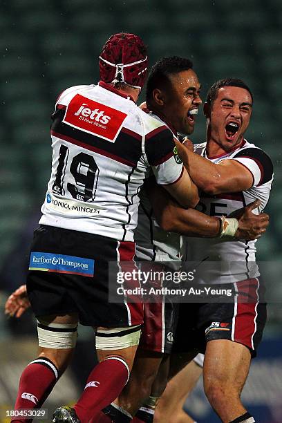 Francis Saili of North Harbour celebrates his try with the team during the round five ITM Cup match between North Harbour and Tasman at North Harbour...