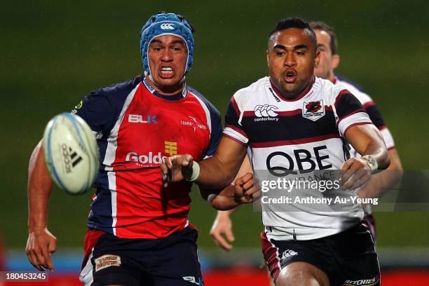 Francis Saili of North Harbour chases down the ball aginst Quentin MacDonald of Tasman during the round five ITM Cup match between North Harbour and...