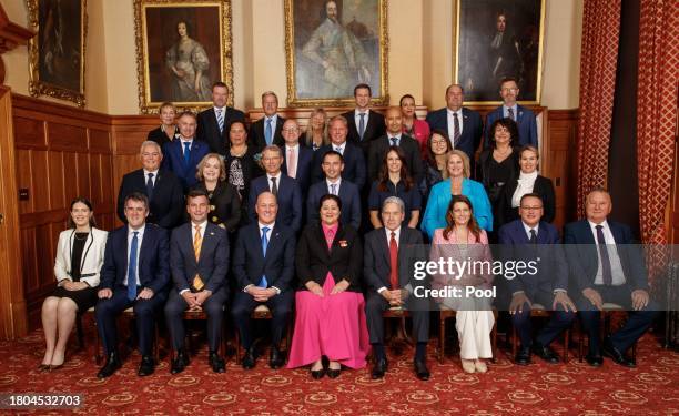 National leader Christopher Luxon , Act leader David Seymour and NZ First leader Winston Peters and their new ministers and undersecretaries in their...