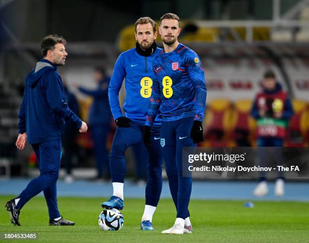 Harry Kane and Jordan Henderson of England warm up prior to the UEFA EURO 2024 European qualifier match between North Macedonia and England at...