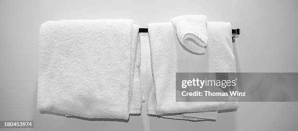 towels in a motel room - folded towel stock-fotos und bilder