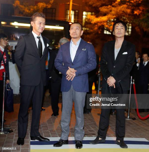 Actor Atsuro Watabe, director Hitoshi Matsumoto and actor Nao Ohmori attend the premiere of "R100" at Ryerson Theatre on September 12, 2013 in...
