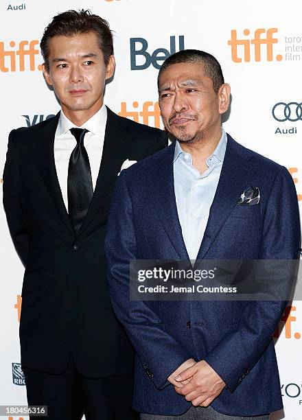 Actor Atsuro Watabe and director Hitoshi Matsumoto attend the premiere of "R100" at Ryerson Theatre on September 12, 2013 in Toronto, Canada.