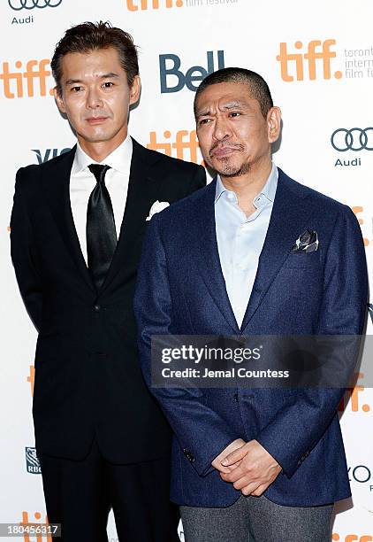 Actor Atsuro Watabe and director Hitoshi Matsumoto attend the premiere of "R100" at Ryerson Theatre on September 12, 2013 in Toronto, Canada.