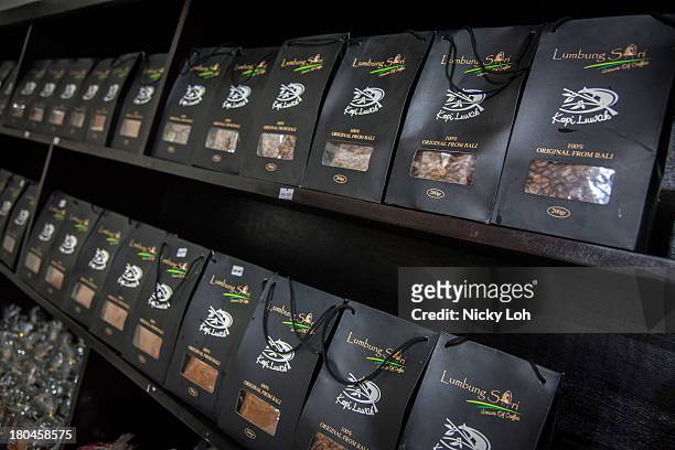 Packages of 'Kopi Luwak' or Civet coffee are displayed inside the Civet coffee farm and cafe on May 27, 2013 in Tampaksiring, Bali, Indonesia. World...