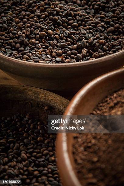 Kopi Luwak coffee seeds are displayed inside a 'Kopi Luwak' or Civet coffee farm and cafe on May 27, 2013 in Tampaksiring, Bali, Indonesia. World...