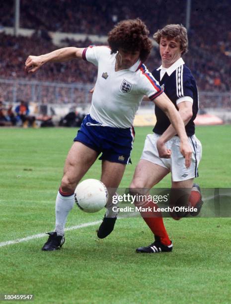 England v Scotland at WembleyKevin Keegan is challenged by Paul Hegarty.