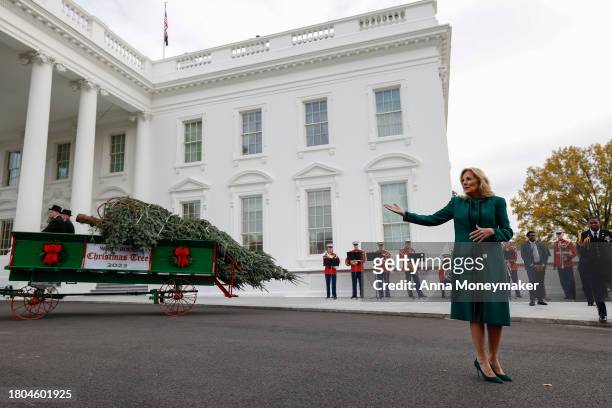 First lady Jill Biden speaks to reporters in front of the official 2023 White House Christmas Tree at the White House on November 20, 2023 in...