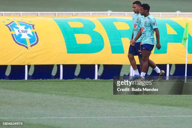 Endrick and Gabriel Jesus walk during a training session of the Brazilian national football team at the squad's Granja Comary training complex on...