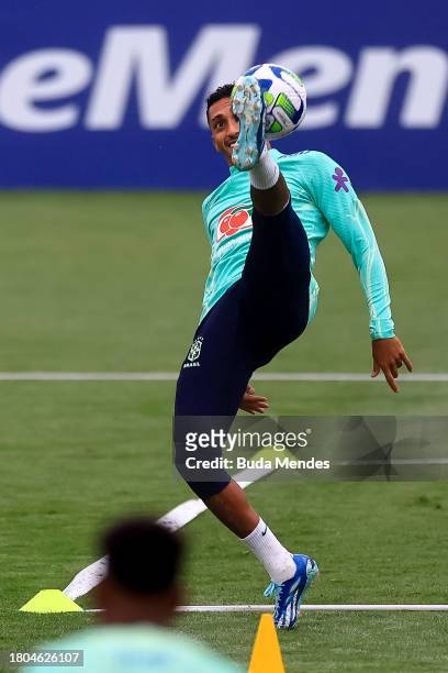 Raphinha kicks the ball during a training session of the Brazilian national football team at the squad's Granja Comary training complex on Novermber...