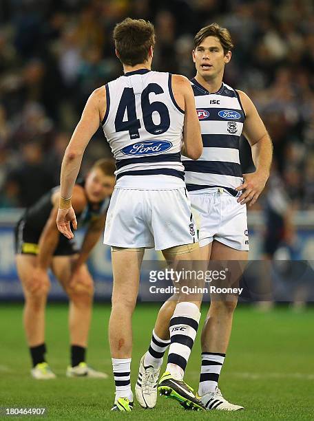 Mark Blicavs and Tom Hawkins of the Cats celebrate winning the Second Semi Final match between the Geelong Cats and the Port Adelaide Power at...