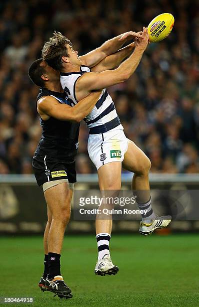 Tom Hawkins of the Cats marks infront of Alipate Carlile of the Power during the Second Semi Final match between the Geelong Cats and the Port...