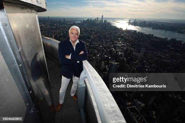 John O'Hurley lights the Empire State Building in honor of the National Dog Show at The Empire State Building on November 20, 2023 in New York City.