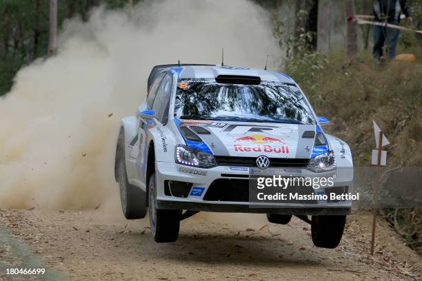 Sebastien Ogier of France and Julien Ingrassia of France compete in their Volkswagen Motorsport Polo R WRC during Day One of the WRC Australia on...
