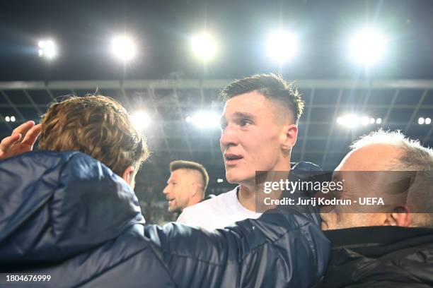 Benjamin Sesko of Slovenia looks emotional after the team's victory in the UEFA EURO 2024 European qualifier match between Slovenia and Kazakhstan at...