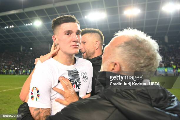 Benjamin Sesko of Slovenia looks emotional after the team's victory in the UEFA EURO 2024 European qualifier match between Slovenia and Kazakhstan at...