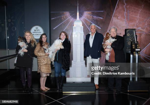John O'Hurley and David Frei , holding "TruDat" light the Empire State Building in honor of the National Dog Show as they pose with Connie Shook...