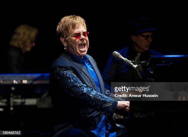 Sir Elton John performs in a rare festival appearance on Day 4 of Bestival at Robin Hill Country Park on September 8, 2013 in Newport, Isle of Wight.