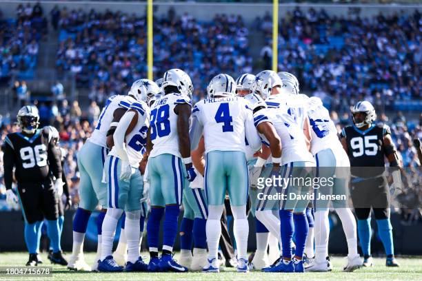 Dak Prescott of the Dallas Cowboys calls a play from the huddle during the first half of an NFL game against the Carolina Panthers at Bank of America...