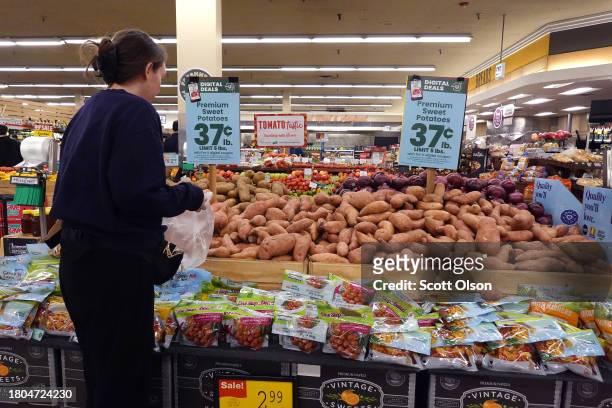 Customers shop for products in front of the Thanksgiving Holiday on November 20, 2023 in Chicago, Illinois. The average cost of this year's...