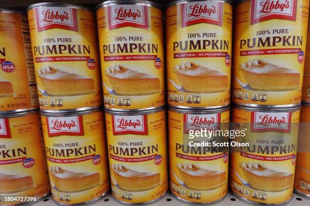 Cans of pumpkin pie filling are offered for sale at a grocery store ahead of the Thanksgiving Holiday on November 20, 2023 in Chicago, Illinois. The...