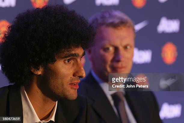 Marouane Fellaini of Manchester United speaks during a press conference to announce his signing at Old Trafford on September 13, 2013 in Manchester,...