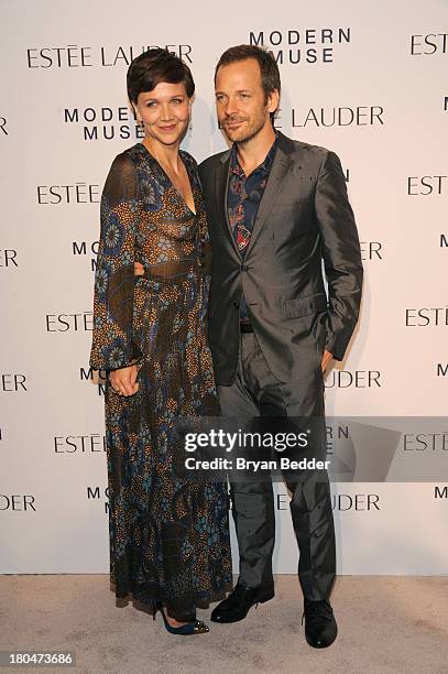 Maggie Gyllenhaal and Peter Sarsgaard attend the Estee Lauder "Modern Muse" Fragrance Launch Party at the Guggenheim Museum on September 12, 2013 in...