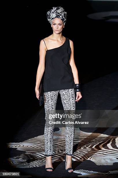 Model showcases designs by Roberto Verino on the runway at Roberto Verino show during Mercedes Benz Fashion Week Madrid Spring/Summer 2014 at Ifema...