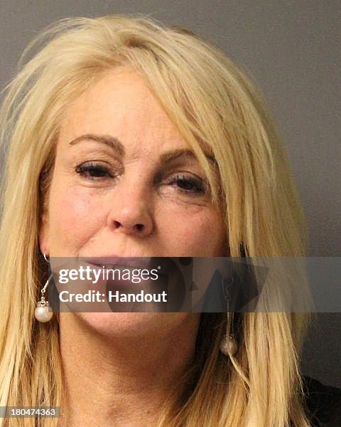 Dina Lohan Booking Photo