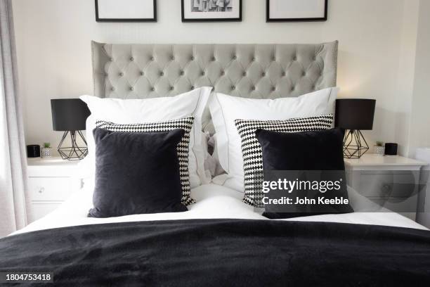 property interiors - bedclothes stock pictures, royalty-free photos & images