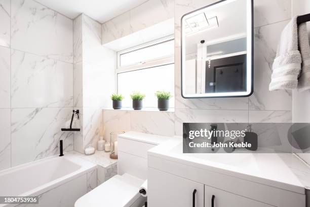 property interiors - domestic bathroom stock pictures, royalty-free photos & images