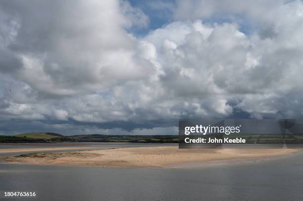 General view of an exposed sandbank at low tide on the River Camel with low heavy clouds on September 21, 2023 in Padstow, Cornwall, England.