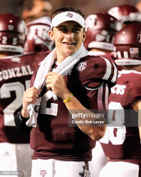 Johnny Manziel of the Texas A&M Aggies on the sidelines during the fourth quarter against the Sam Houston State Bearkats at Kyle Field on September...