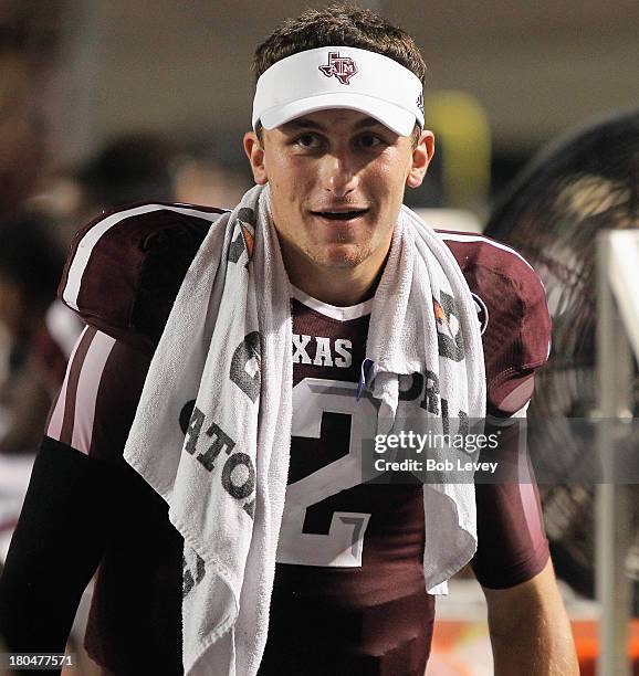 Johnny Manziel of the Texas A&M Aggies on the sidelines during the fourth quarter against the Sam Houston State Bearkats at Kyle Field on September...