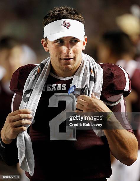 Johnny Manziel of the Texas A&M Aggies on the sidelines during the fourth quarter against the Sam Houston State Bearkats at Kyle Field on September...