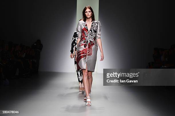 Models walk the runway at the Jean-Pierre Braganza show during London Fashion Week SS14 at BFC Courtyard Showspace on September 13, 2013 in London,...