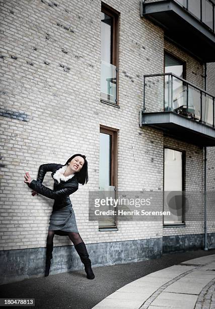 stuck in the wall - people trapped stock pictures, royalty-free photos & images