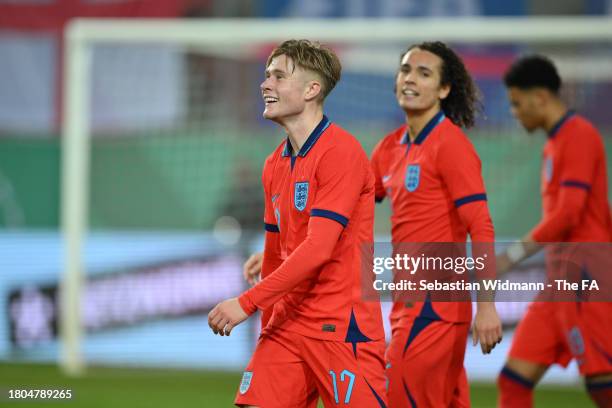 Sam Bell of U20 England smiles during the U20 International Friendly match between U20 Germany v U20 England at Jahnstadion on November 20, 2023 in...