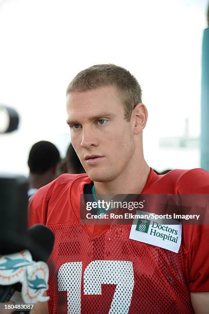 Ryan Tannehill hosts students from American Senior High School at Dolphins training camp on August 15, 2013 in Davie, Florida.