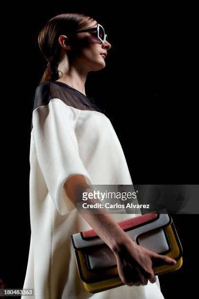 Model showcases designs by Victorio & Lucchino on the runway at Victorio & Lucchino show during Mercedes Benz Fashion Week Madrid Spring/Summer 2014...